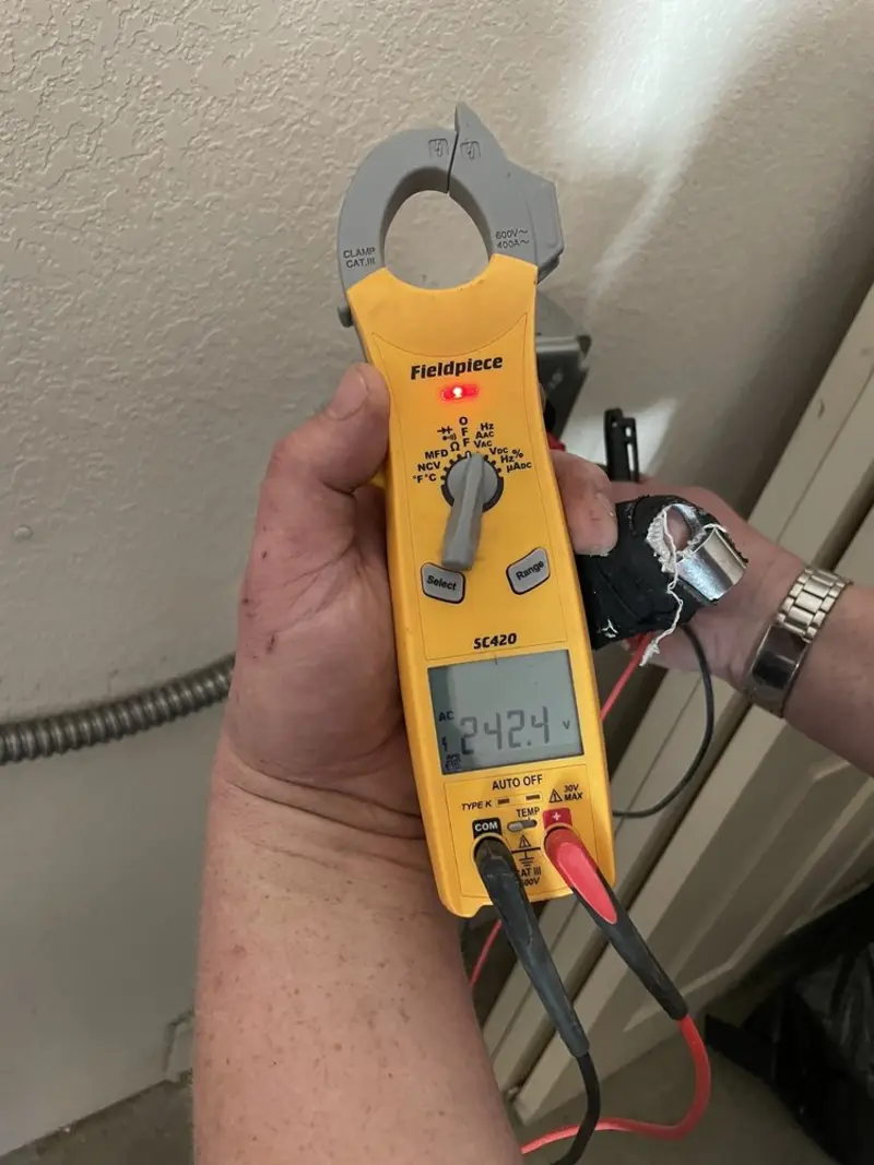 Voltage testing with clamp meter during Circuit Breaker Repair in Wellston